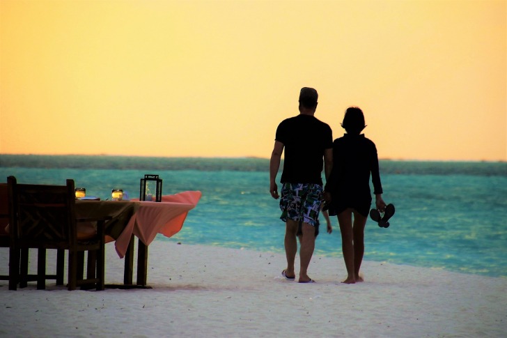 walking on the beach for a romantic dinner