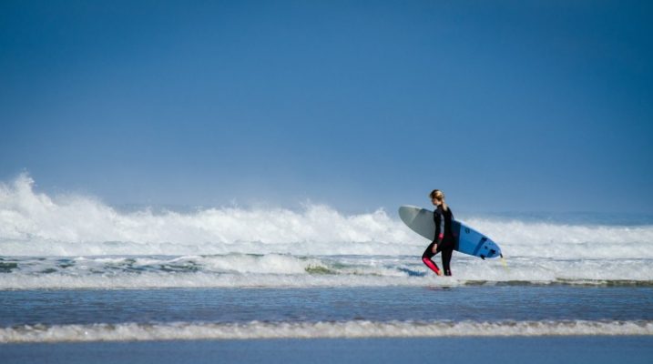 Girl going surfing